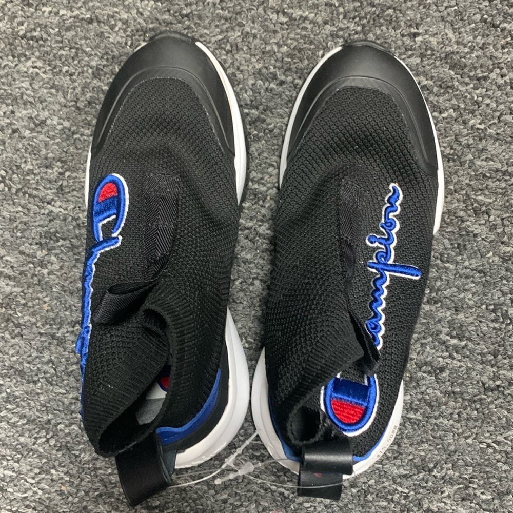 Size one big kids champion shoes slip on New used once